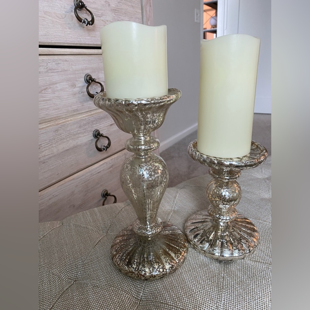 Two designer sconses with battery operated candels